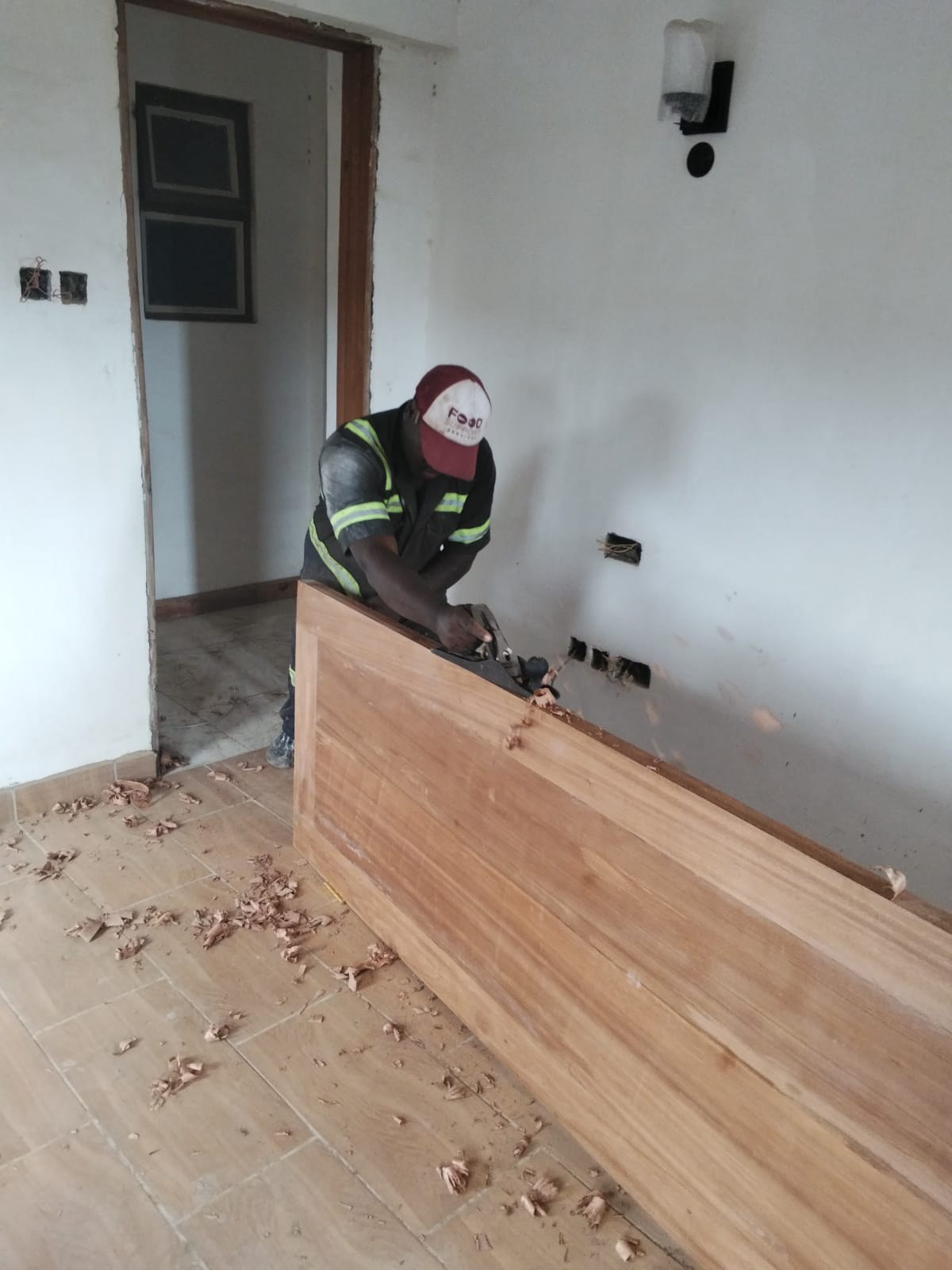 Carpenter carrying out interior joinery work