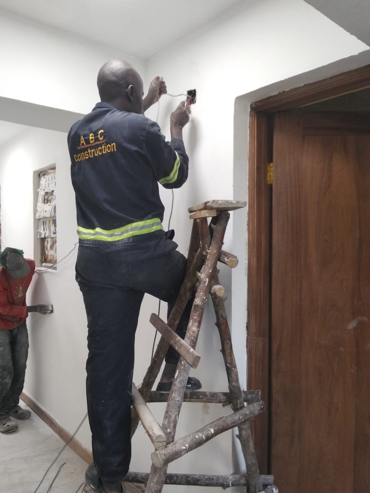 ABC team member carrying out electrical work